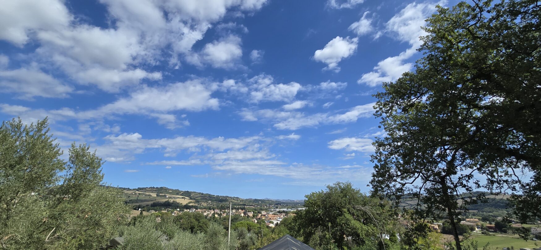 Actual panoramic view across the hills of Le Marche from the terrace of safari tent Did